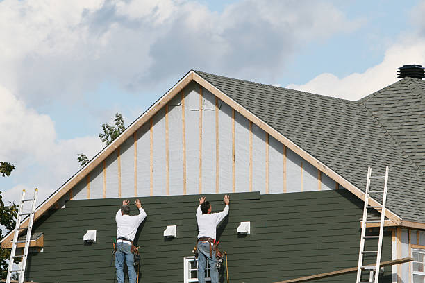 Professional Emergency Siding Repair technician working in Canton, IL